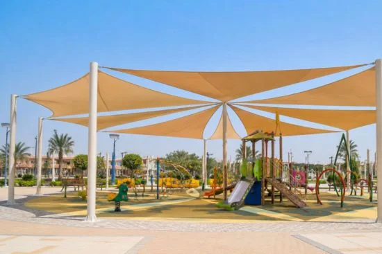 HDPE playground shade structure providing sun protection for a school and park play area in UAE