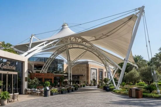 Premium commercial tensile shade structure installed at a shopping mall and outdoor business area in UAE