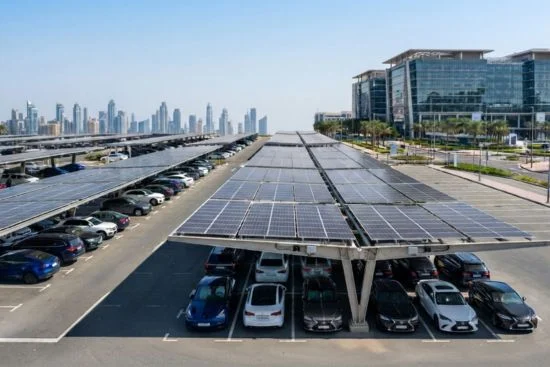 Solar car parking shade structure with integrated solar panels for commercial parking in UAE